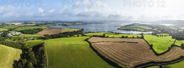 Panorama of Farms and Fields over River Tamar Estuary from a drone, Cornwall, England, United Kingdom, Europe
