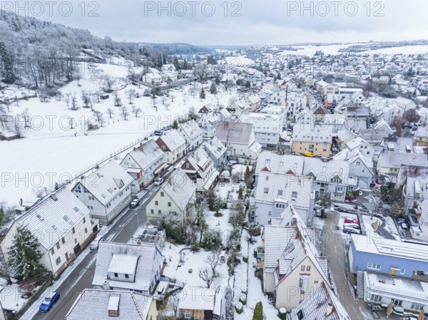 Snow-covered settlement with snow-covered roofs and surrounding winter landscape, Aidlingen, Böblingen district, Germany, Europe