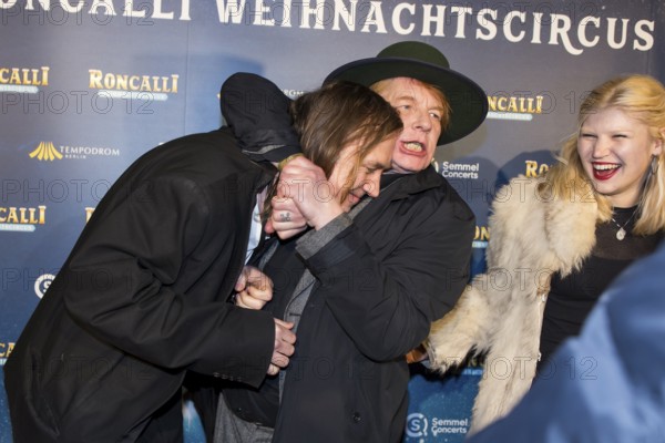 Lars Eidinger, Ben Becker and Lilith Maria Dörthe Becker at the premiere of the 20th Original Roncalli Weihnachtscircus in Berlin's Tempodrom on 20 December 2024