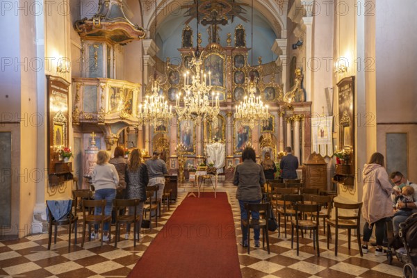 Service in the interior of the Greek Catholic parish church of St Barbara in Vienna, Austria, Europe