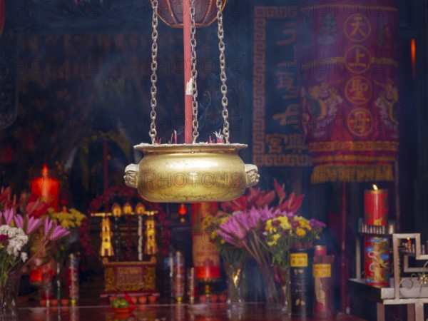 Chinese temple, smoke and brass bowl, Ban Hin Kiong Temple, Manado, Sulawesi