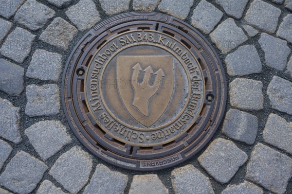 Municipal manhole cover with symbol of the navy, Kulmbach, Upper Franconia, Bavaria, Germany, Europe