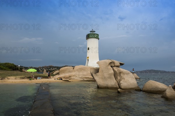 Lighthouse with beach and bizarre granite rocks, Spiaggia Porto Faro, Faro di Punta Palau, Palau, Costa Smeralda, Sardinia, Italy, Oceania