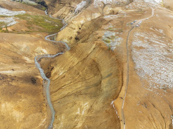 Steaming hot springs and colourful rhyolite mountains, parking lot, aerial view, Hveradalir geothermal area, Kerlingarfjöll, Icelandic highlands, Iceland, Europe