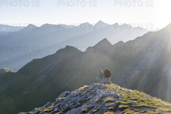 Hiker enjoying the mountain panorama in the morning, Venedigergruppe, Hohe Tauern, Austria, Europe