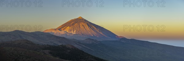 Panorama from east over the Teide National Park, Parque Nacional del Teide, to Pico del Teide, 3715m, at sunrise, Tenerife, Canary Islands, Spain, Europe