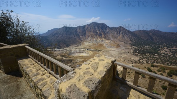 Breathtaking view of volcanic landscape with rocky balustrade and clear sky in the background, volcanism, volcanic island, Nikia viewpoint, Nisyros, Dodecanese, Greek Islands, Greece, Europe