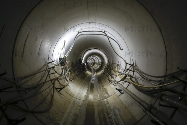 Theme photo Emscher conversion, the Emscher system will be wastewater-free in 2021 - new construction of a sewer on the Boye, the second largest tributary of the Emscher, supply lines run in the DN 3500 tunnel from the shaft to the tunnel boring machine, the Boye is being renaturalised, is being transformed into a near-natural watercourse, was previously an open, The ecological conversion of the Emscher system consists of the construction of a central wastewater treatment system in the Ruhr area, the construction of sewers and the renaturalisation of the Emscher and its tributaries, archive photo from 13.11.2014, Bottrop, Ruhr area, North Rhine-Westphalia, Germany, Europe