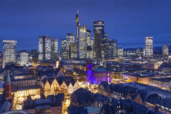 St Paul's Church in Frankfurt am Main will be illuminated in blue in the middle of the Christmas market on 10 December 2024, International Human Rights Day. This commemorates the declaration of the UN Human Rights Charter of 10 December 1948. Frankfurt am Main, Römerberg, Hesse, Germany, Europe