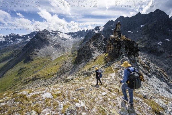 Two climbers on a mountain ridge, ascent to the summit of Mont de la Blana, view of rocky mountain landscape, Hérménence, Valais Alps, Valais, Switzerland, Europe