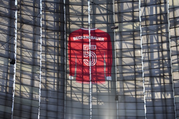 Larger-than-life jersey of Franz Beckenbauer with shirt number 5 hanging in the grandstand roof of the south curve, 125th anniversary of FC Bayern Munich FCB, Allianz Arena, Munich, Bavaria, Germany, Europe