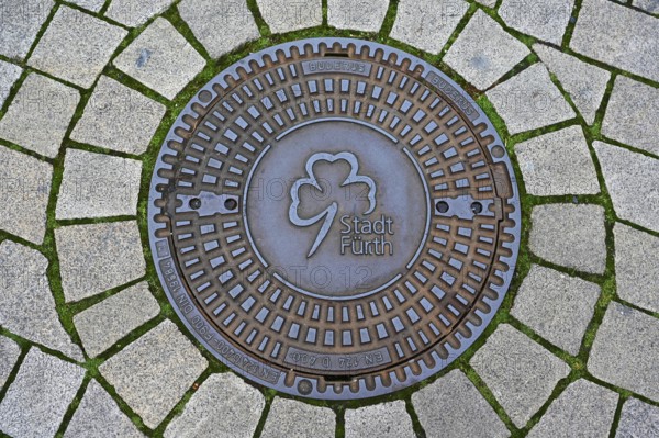 Manhole cover with coat of arms of the city of Fürth-Bavaria, Middle Franconia, Bavaria, Germany, Europe