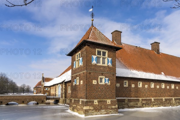 The snow-covered moated castle Haus Borg in winter, Drensteinfurt, Münsterland, North Rhine-Westphalia, Germany, Europe
