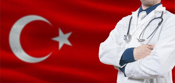 Turkey Health and Care concept. Male doctor on Turkey flag. Doctor with crossed arms on Turkey flag