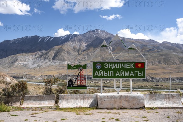 Town sign in Cyrillic script, Engilchek, Tian Shan, Kyrgyzstan, Asia