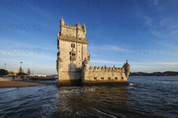 Belem Tower or Tower of St Vincent, famous tourist landmark of Lisboa and tourism attraction, on the bank of the Tagus River Tejo on sunset. Lisbon, Portugal, Europe