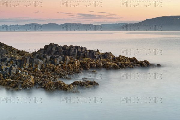 Basalt columns, columnar basalt, coast, long exposure, Hofsos or Hofsós, Skagafjörður, Norðurland, Iceland, Europe