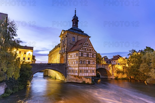 The Old Town Hall in the river Regnitz at dusk, Old Town of Bamberg, Upper Franconia, Bavaria, Germany, Europe