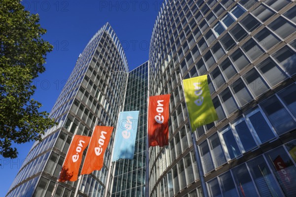 Essen, North Rhine-Westphalia, Germany, E.ON headquarters. e.on company logos on flags in front of the headquarters, Europe