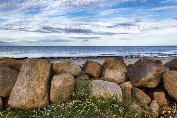 Coastal defence, boulders overlooking the sea, dusk, Carne Beach, Wexford, Gerrans Bay, Roseland Peninsula, Ireland, Europe