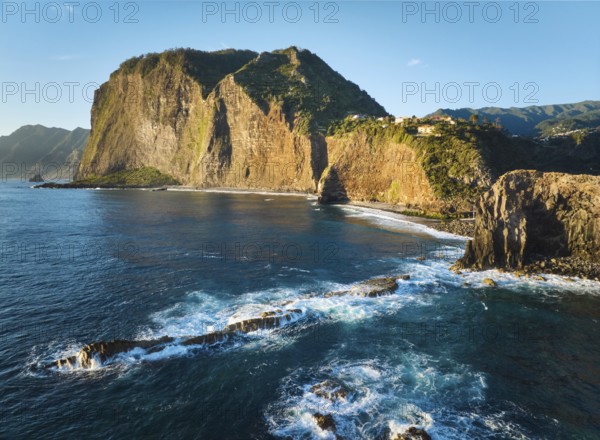 Aerial view of Madeira cliffs coastline landscape on sunrise, Guindaste viewpoint, Madeira island, Portugal, Europe