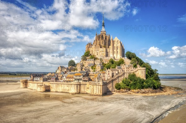 Impressive island with historic abbey, surrounded by sand and sky, Le Mont-Saint-Michel