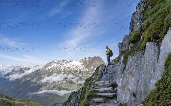 Mountaineer on a hiking trail, view of mountain panorama, Chamonix, Haute-Savoie, France, Europe