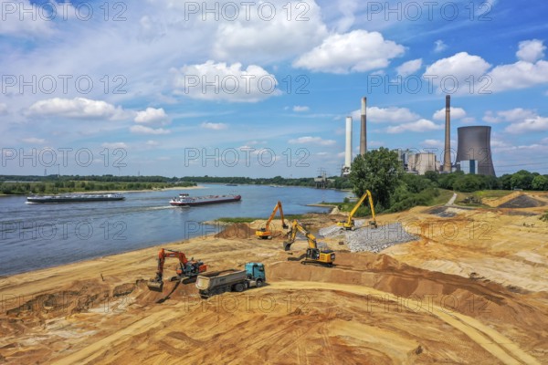 Dinslaken, Voerde, North Rhine-Westphalia, Germany, Emscher estuary into the Rhine. Construction site of the new Emscher estuary in front of the decommissioned STEAG coal-fired power station in Voerde. The mouth of the Emscher into the Rhine is being moved almost 500 metres north from Dinslaken to Voerde. Fish will then be able to swim barrier-free up the new Emscher from the Rhine through a newly created floodplain area. Following the construction of a parallel sewer, the Emscher has been completely free of sewage since January 2022. The river was previously an open, above-ground combined sewer with rainwater and wastewater, Europe