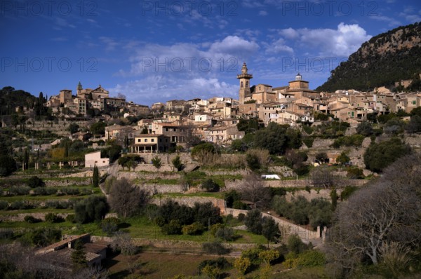 View of the mountain village of Valldemossa, Church Iglesia de la Cartuja, Real Cartuja (Royal Carthusian Monastery), Parish Church Església de Sant Bartolomeu, Tramuntana Mountains, Serra de Tramuntana, Majorca, Balearic Islands, Balearic Islands, Spain, Europe