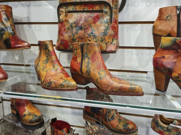 Photo of colourful ankle boots and handbags with floral patterns, La Boca district, Buenos Aires, Argentina, South America