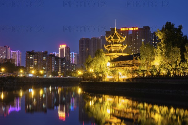 Wangjiang Pavilion Park (Wangjianglou Park) view over Jinjiang River, Chengdu, Sichuan, China illuminated at night