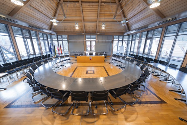 Large, modern conference room with wooden ceiling and large windows, equipped with table and chairs, Nagold Town Hall, Black Forest, Germany, Europe