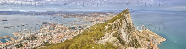 Panoramic view of the city and harbour with a striking rock in the centre, Gibraltar, Europe