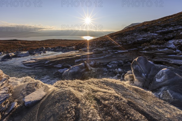 Sunrise at a river, waterfall, morning light, autumn, Torneträsk, Laponia, Lapland, Sweden, Europe