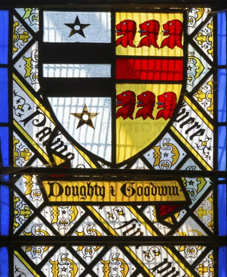 Stained glass window Doughty family crest by Thomas Willement c 1843, Theberton church, Suffolk, England, UK