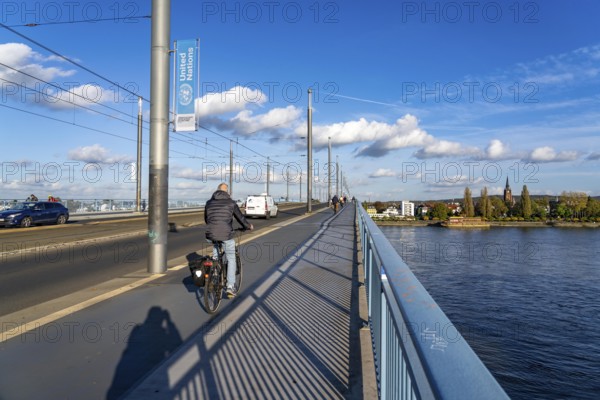 Traffic on the Kennedy Bridge, middle of the 3 Rhine bridges in Bonn, connects the centre of Bonn and the district of Beuel, federal road B56, light rail lines and footpaths and cycle paths, Bonn North Rhine-Westphalia, Germany, Europe