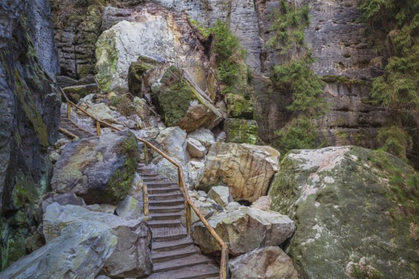 Stairway at the Schwedenlöcher, a narrow gorge of the Amselgrund near the village of Rathen in Saxon Switzerland National Park, Saxony, Germany, Europe