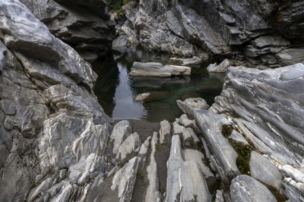 Rocks, granite rock formations in the Maggia River near Ponte Brolla, in the Maggia Valley, Valle Maggia, Canton Ticino, Switzerland, Europe
