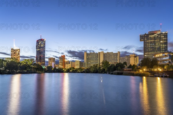 Kaiserwasser, UNO-City and the skyline of Donau City at dusk, Vienna, Austria, Europe