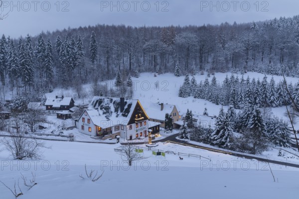 Pension Oberlochmühle with Christmas lights in the snow, Oberlochmühle, Deutschneudorf, Erzgebirge, Saxony, Germany, Europe