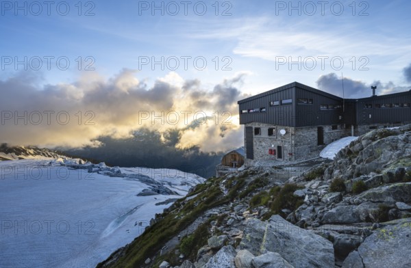 Mountain hut Refuge Albert 1er, high alpine mountain landscape at sunset, Glacier du Tour, Chamonix, Haute-Savoie, France, Europe
