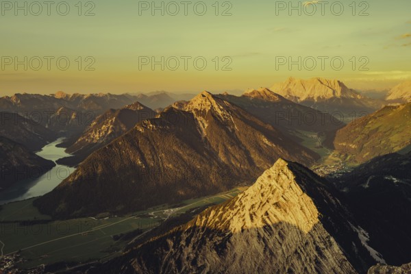 Thaneller summit at sunset in the Lechtal valley in Tyrol with a wonderful view of the surrounding mountains. Tyrol, Austria, Europe