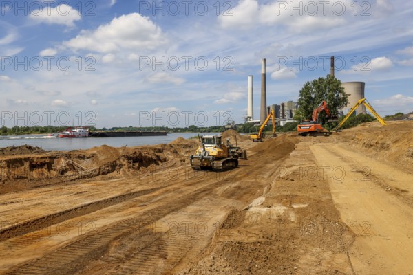 Dinslaken, Voerde, North Rhine-Westphalia, Germany, Emscher estuary into the Rhine. Construction site of the new Emscher estuary in front of the decommissioned STEAG coal-fired power station in Voerde. The mouth of the Emscher into the Rhine is being moved almost 500 metres north from Dinslaken to Voerde. Fish will then be able to swim barrier-free up the new Emscher from the Rhine through a newly created floodplain area. Following the construction of a parallel sewer, the Emscher has been completely free of sewage since January 2022. The river was previously an open, above-ground combined sewer with rainwater and wastewater, Europe
