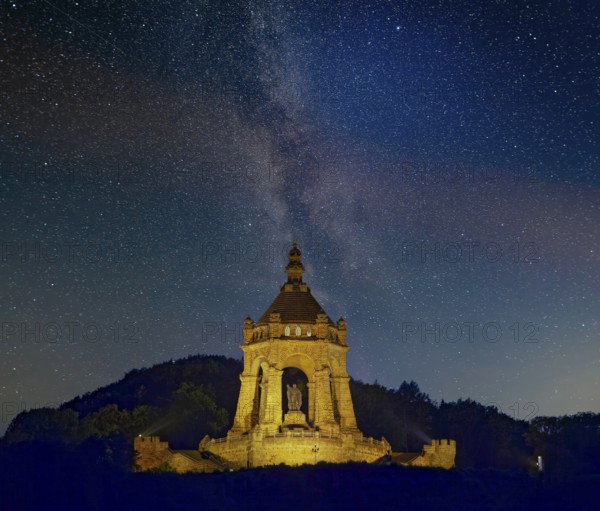 Kaiser Wilhelm monument illuminated starry sky night Porta Westfalica Germany
