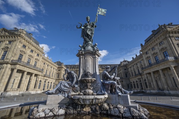 New Baroque Frankonia Fountain on the Residenzplatz in Würzburg. Created in 1894 by the architect Gabriel von Seidl and the sculptor Ferdinand von Miller, Würzburg, Lower Franconia, Bavaria, Germany, Europe