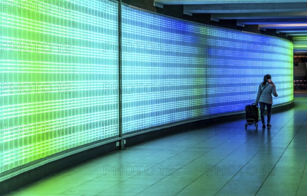 Passage under Essen's main railway station, connects entrances to the city and the main railway station, with the underground station, illuminated, LED wall, few people, Germany, Europe