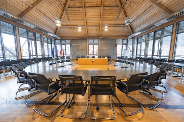 Inviting conference room with round wooden table and stylish furnishings for formal meetings, Nagold Town Hall, Black Forest, Germany, Europe