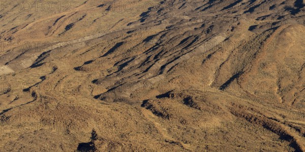 Panorama during the ascent to the Alto de Guajara, 2715m, over the Teide National Park, Parque Nacional del Teide, with solidified lava flows at the foot of the Pico del Teide, 3715m, at sunrise, Tenerife, Canary Islands, Spain, Europe