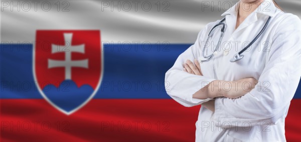 Doctor with crossed arms on Slovakian flag. Slovakia health and care concept. Female doctor on Slovakian flag