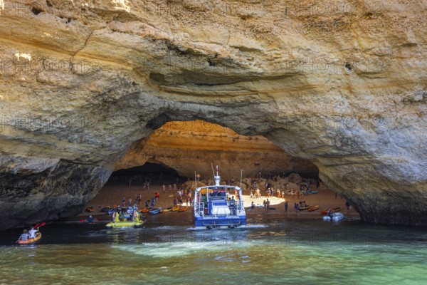 The world-famous Benagil Cave is only accessible from the sea and can be used at low tide. Numerous tourists from all over the world crowd into the nature-created cave in the Portuguese Algarve every day., Benagil, Faro, Portugal, Europe